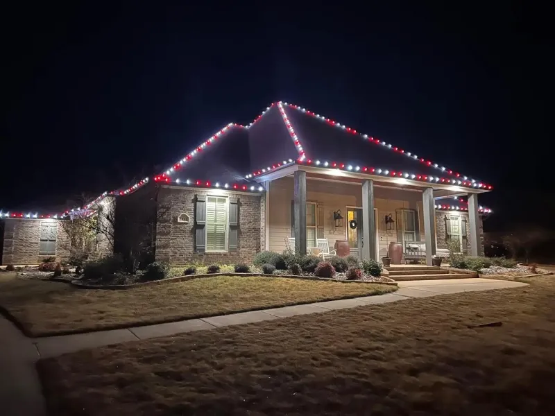 House with red and white lights on the roof